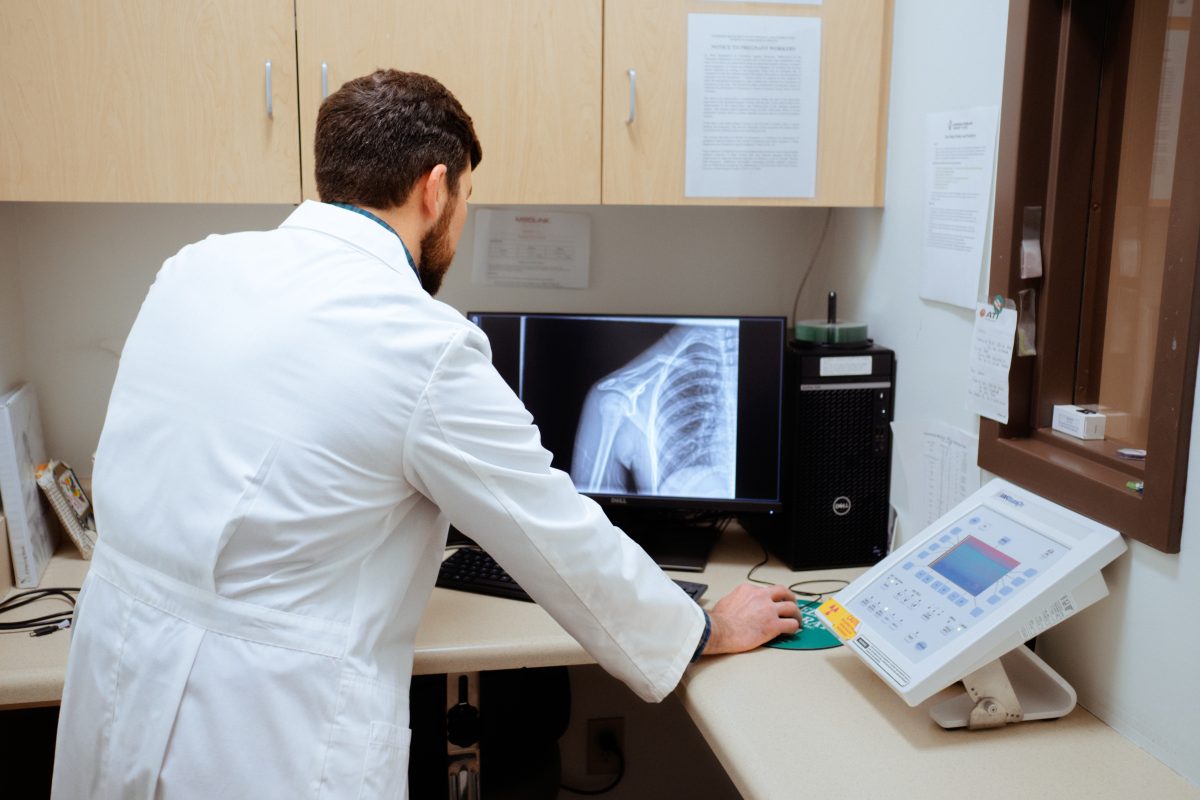 DSC00037-scaled-1 Doctor examining digital xray